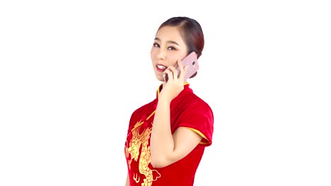 Young-Chinese-woman-talking-with-smartphone