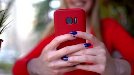 Close-up-of-woman-hand-using-mobile-phone