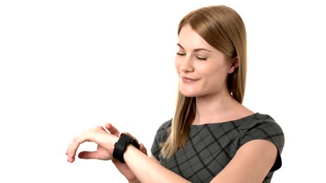 Beautiful-businesswoman-in-grey-dress-reading-emails-on-her-smartwatch.-Isolated-white-background