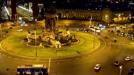 Plaza-de-Espana-in-Barcelona-at-night.-Roundabout-city-traffic.-FullHD-clip