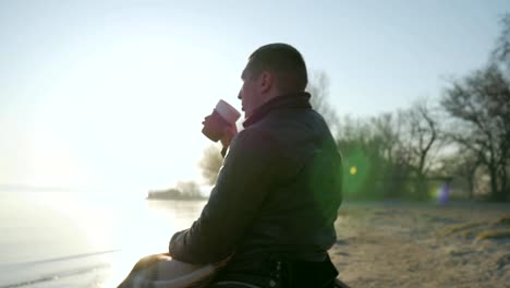 Disabled-man-close-up-drinks-coffee,-portrait-lonely-man