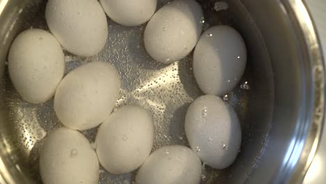 eggs-are-cooked-in-a-pan-close-up,-top-view