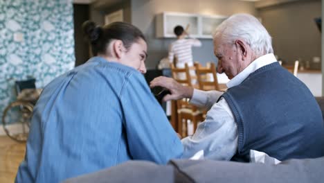 Volunteers-Visiting-Elderly-Man