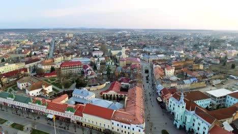 Aerial-footage-of-Mukachevo-city-center---top-view-at-sunset-time