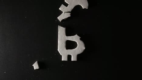 Gypsum-bitcoin-symbol-falls-and-breaks