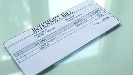 Internet-bill-second-notice,-hand-stamping-seal-on-document,-payment,-tariff