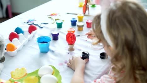 Little-Girl-Preparing-for-Easter-with-Mother