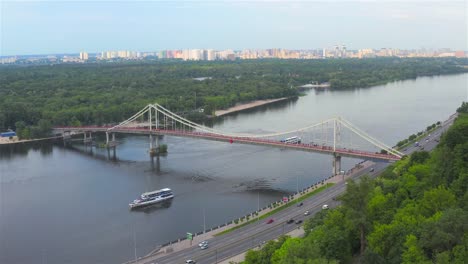 Aerial-view-of-the-Pedestrian-Bridge-and-the-Dnieper-River,-Kyiv