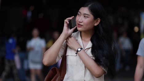 Asian-woman-using-mobile-phone