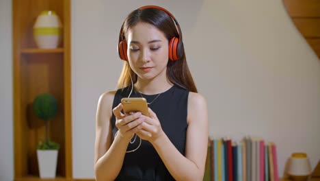 Asian-Girl-Listening-to-Music