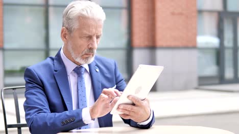 Old-Businessman-Using-Tablet,-Outdoor