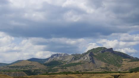 Mountainous-landscape.-Cirrus-clouds-are-running-across-the-blue-sky.