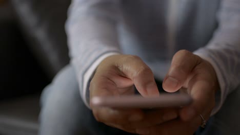 Close-up-woman-hands-texting-message-on-mobile-smart-phone-for-communication.