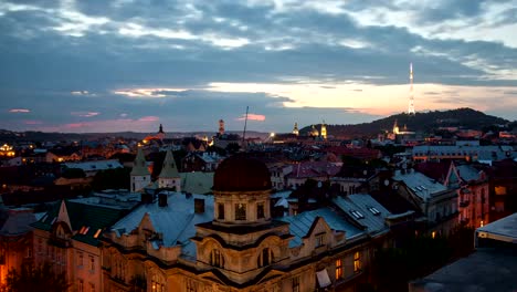 Night-timelapse-in-old-city-with-moving-clouds.-Lviv,-Ukraine.