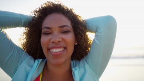 Portrait-of-Ethnic-female-resting-with-sun-flare