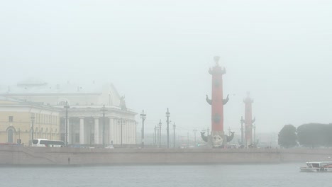 FOG:-Spit-of-the-Vasilievsky-Island-and-a-tour-ship-in-the-morning---St.-Petersburg,-Russia