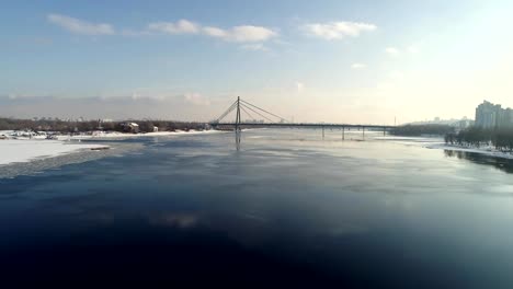 Landscape-with-suspension-Moscow-Bridge-(renamed-South-bridge)-across-the-Dnieper-river,-Obolon,-Kiev,-Ukraine