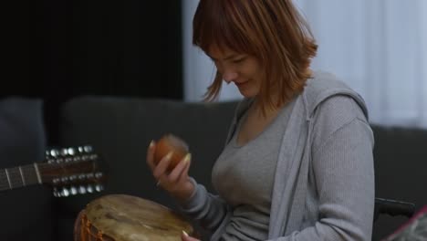 Disabled-Woman-and-her-Boyfriend-Playing-Song-at-Home