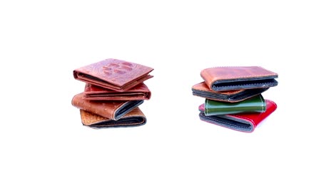 Group-wallet-of-leather-rotating-on-isolated