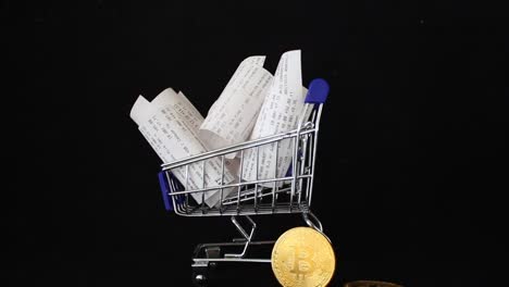 Receipts,-supermarket-shopping-trolley,-bitcoin-payment