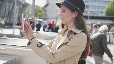 Pretty-Caucasian-woman-communicating-by-sending-text-messages-on-digital-tablet