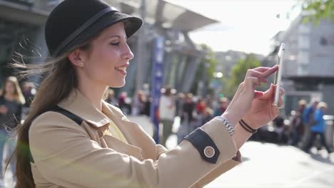 Pretty-Caucasian-woman-communicating-by-sending-text-messages-on-digital-tablet