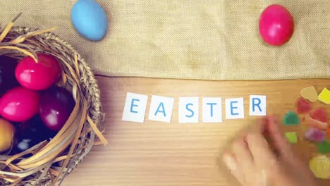 Happy-Easter-on-table-decorated-with-easter-eggs.