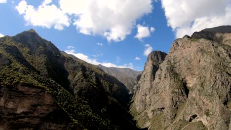 Timelapse-gorge-cliffs-with-moving-sky-shadows-and-clouds.