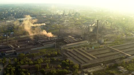 urban-skyline-with-the-smoke-from-the-plant-pipes-above-the-city-buildings