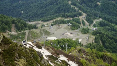 Aerial-view-of-mountain-ski-resort.-Beautiful-mountains-in-spring