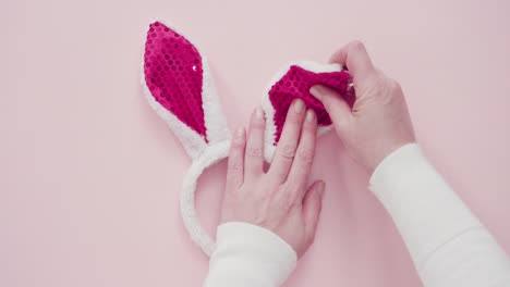 Easter-bunny-ears-on-a-pink-background.