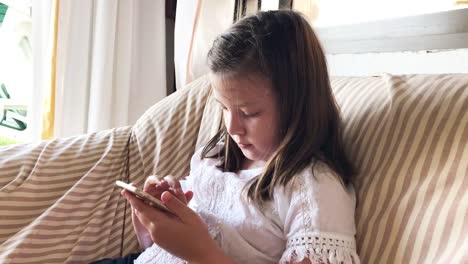 Little-girl-using-smartphone