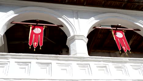 Red-Khorugv-with-golden-crosses,-religious-Easter-decorations-in-orthodox-church,-Russia