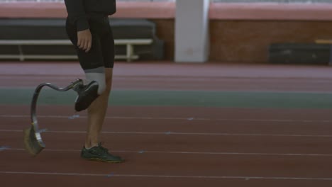 Runner-with-Prosthetic-Leg-Walking-on-Track