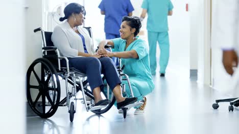 African-American-female-nurse-and-disabled-patient-consult