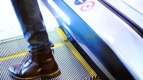 Escalator.-Steps-with-a-yellow-escalator