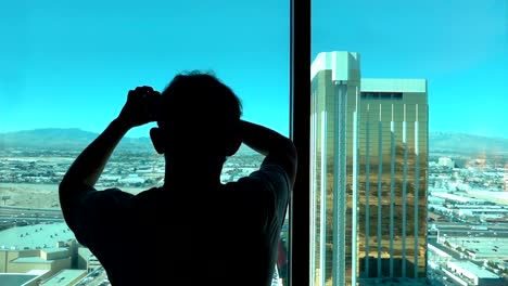 Man-taking-picture-of-Las-Vegas-view-in-slow-motion-250fps