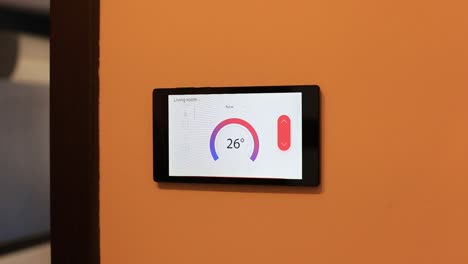 Smart-home-climate-control-device-on-a-wall