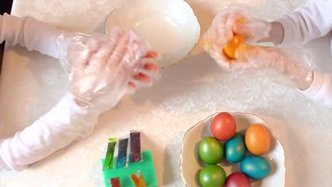 Children-paint-Easter-eggs