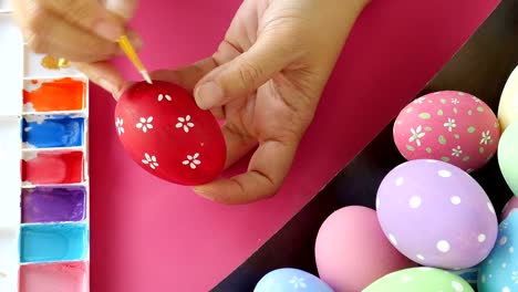 People-painting-colorful-Easter-eggs