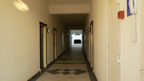 Interior-of-Hotel-Corridor-with-Doors