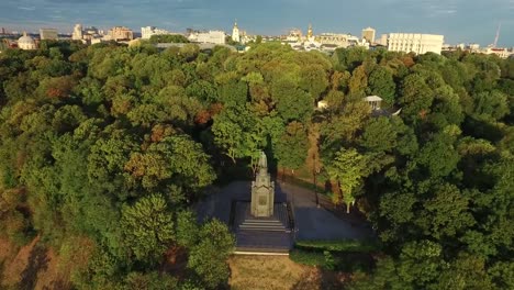 Aerial-view-monument-saint-Prince-Vladimir-with-cross-in-summer-park-Kiev-city