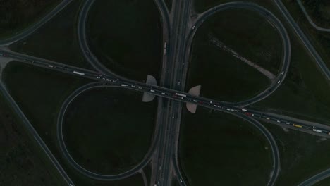 Night-Aerial-view-of-highway-and-overpass-in-city.