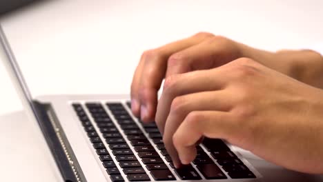 hand-man-close-up-typing-on-the-keyboard.