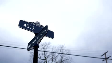 Symbolic-crossroads-typography-with-dark-sky---401K-and-Hedge-Funds