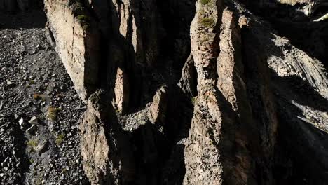 Aerial-view-of-structured-rocks-with-crumbling-debris.-Cellular-rocks.