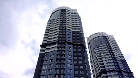 Two-high-rise-houses-skyscrapers-shrouded-in-mist.