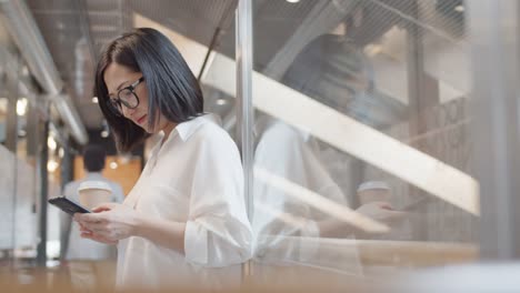 Asian-Businesswoman-on-Coffee-Break