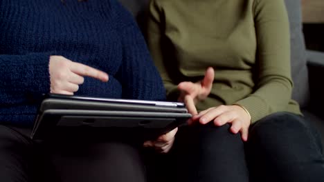 Deaf-mute-women-working-with-digital-tablet-indoor