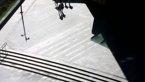 City-landscape.view-on.-Silhouettes-of-people-walking-down-the-street.